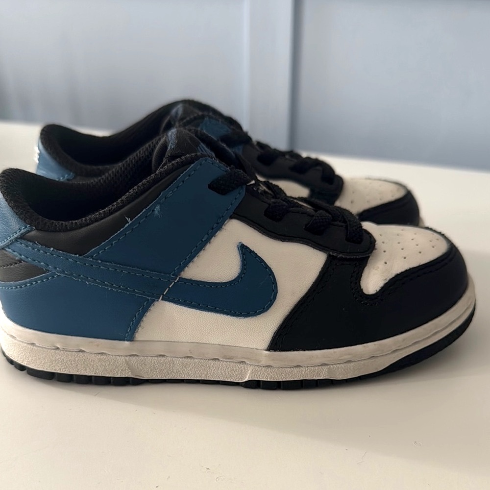 Nike Black and Blue Sneakers with Classic Design